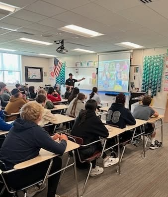 Sean Thomas teaching in a classroom