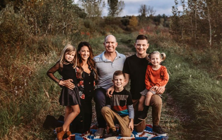 Sean Thomas with his wife Alyssa and their four children