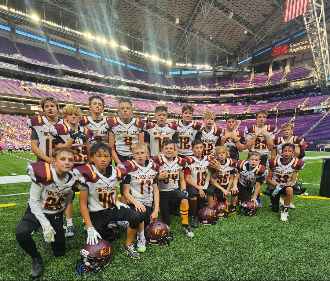 Forest Lake youth football team at U.S. Bank Stadium